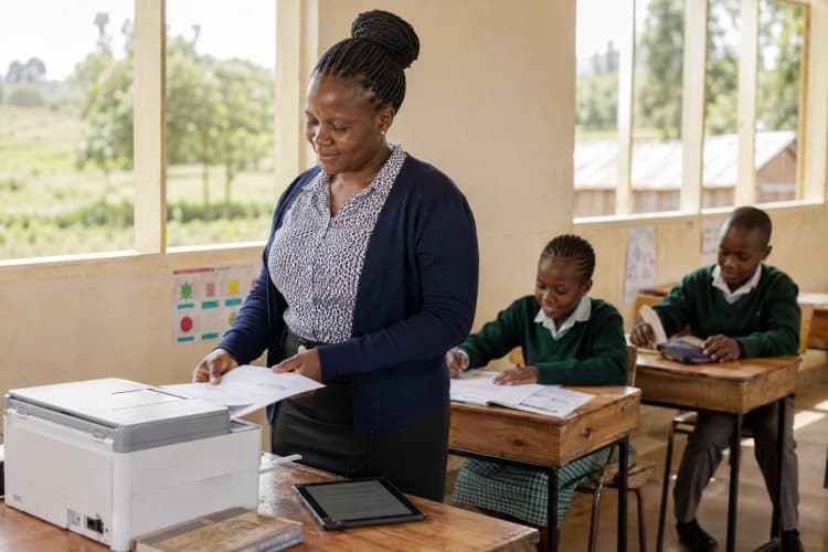 A teacher preparing learning materials